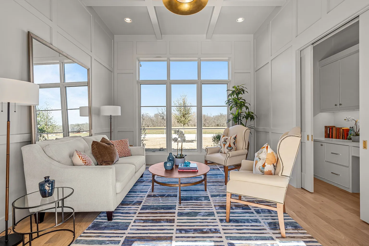 9825 Loire Valley Trail - Sitting room with hidden office