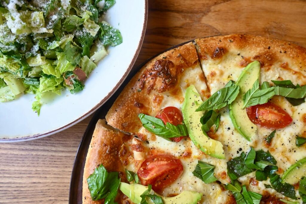 Cork and Pig Tavern, So Cal pizza, and Caesar salad