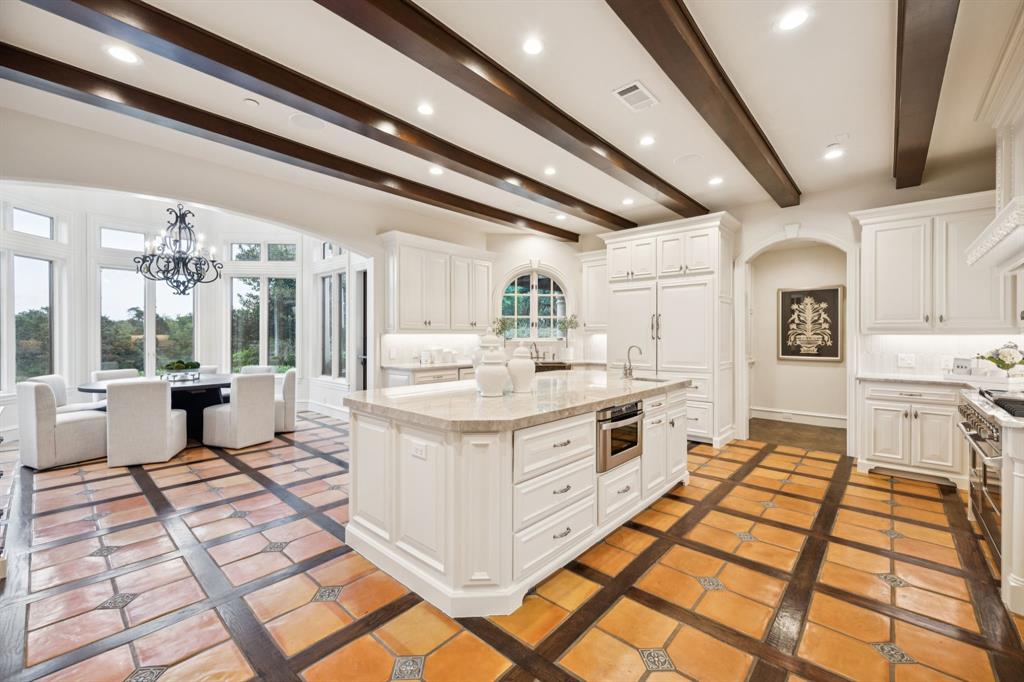 1900 Shady Oaks Drive - Stunning kitchen with Saltillo tile and inlaid wood flooring.