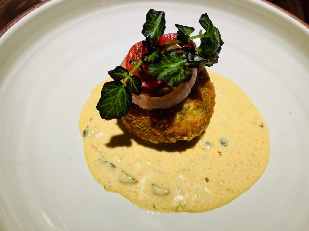 Upgrades include the Lonestar Crab Cake at Cattlemen's Steakhouse