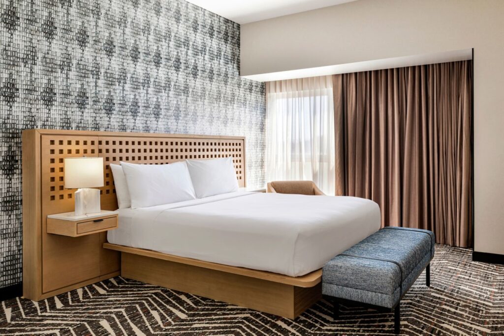 Suites are dressed with layers of fabrics and a headboard reflecting Legorreta's signature use of square windows