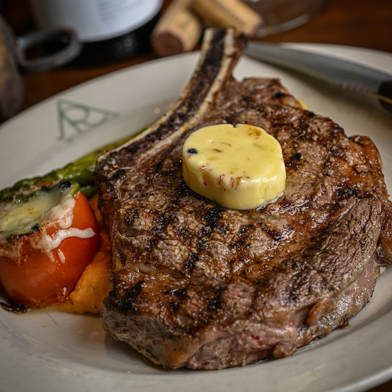 Reata's 20 ounce bone-in ribeye with cognac butter