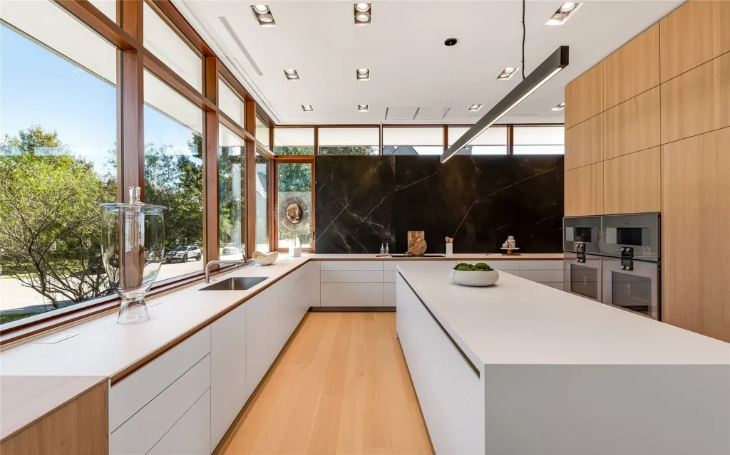 3736 Aviemore Drive - the kitchen with warm woods, sleek lines and natural light