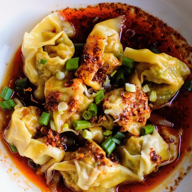Teddy Wong's - delicate dumplings swimming in house-made chili oil.